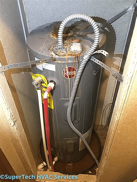 water heater leaking from top seam|Leak from Top of Water Heater: Common Causes and Effective。